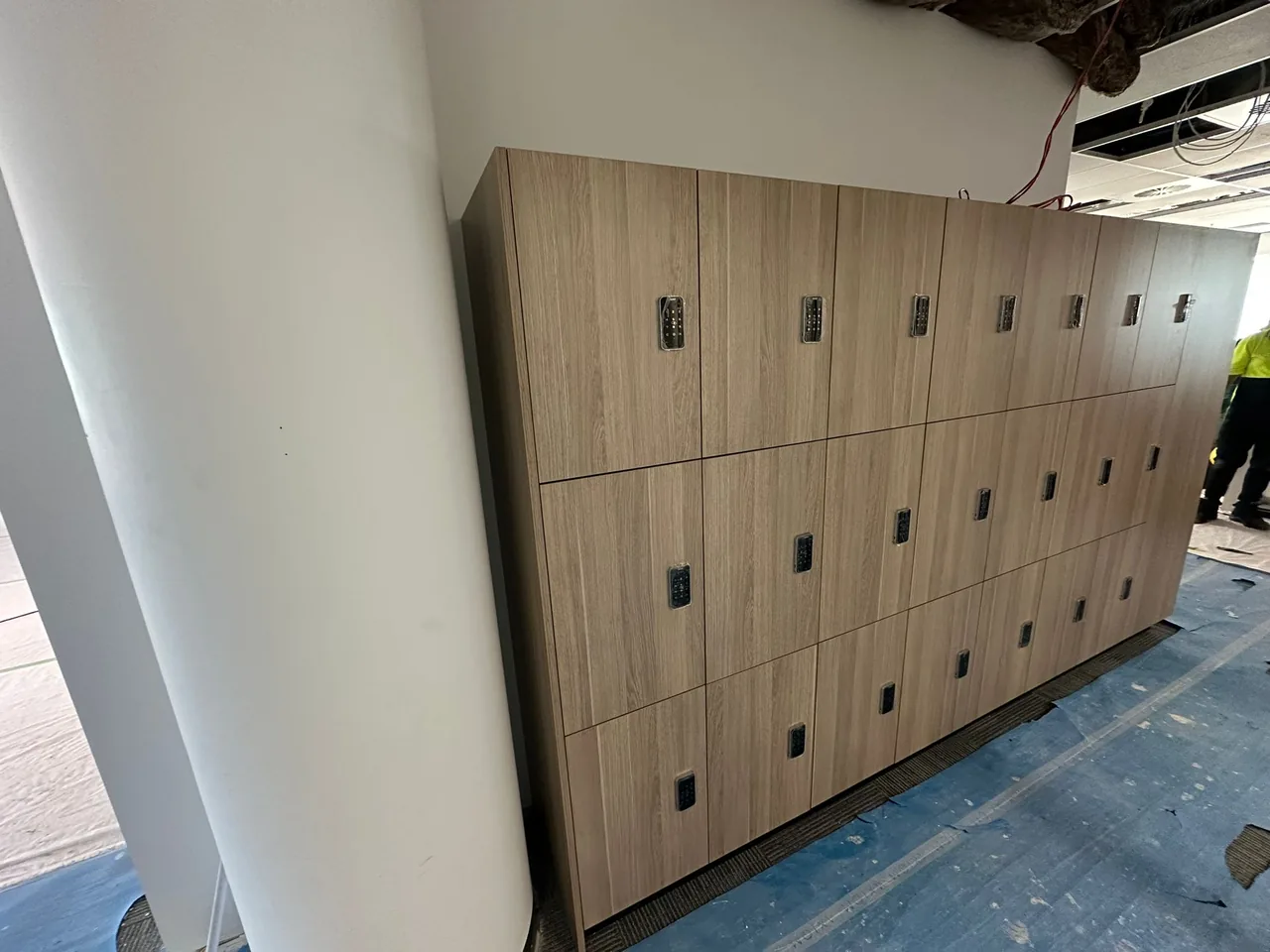 Lockers installed beside a structural column in an office