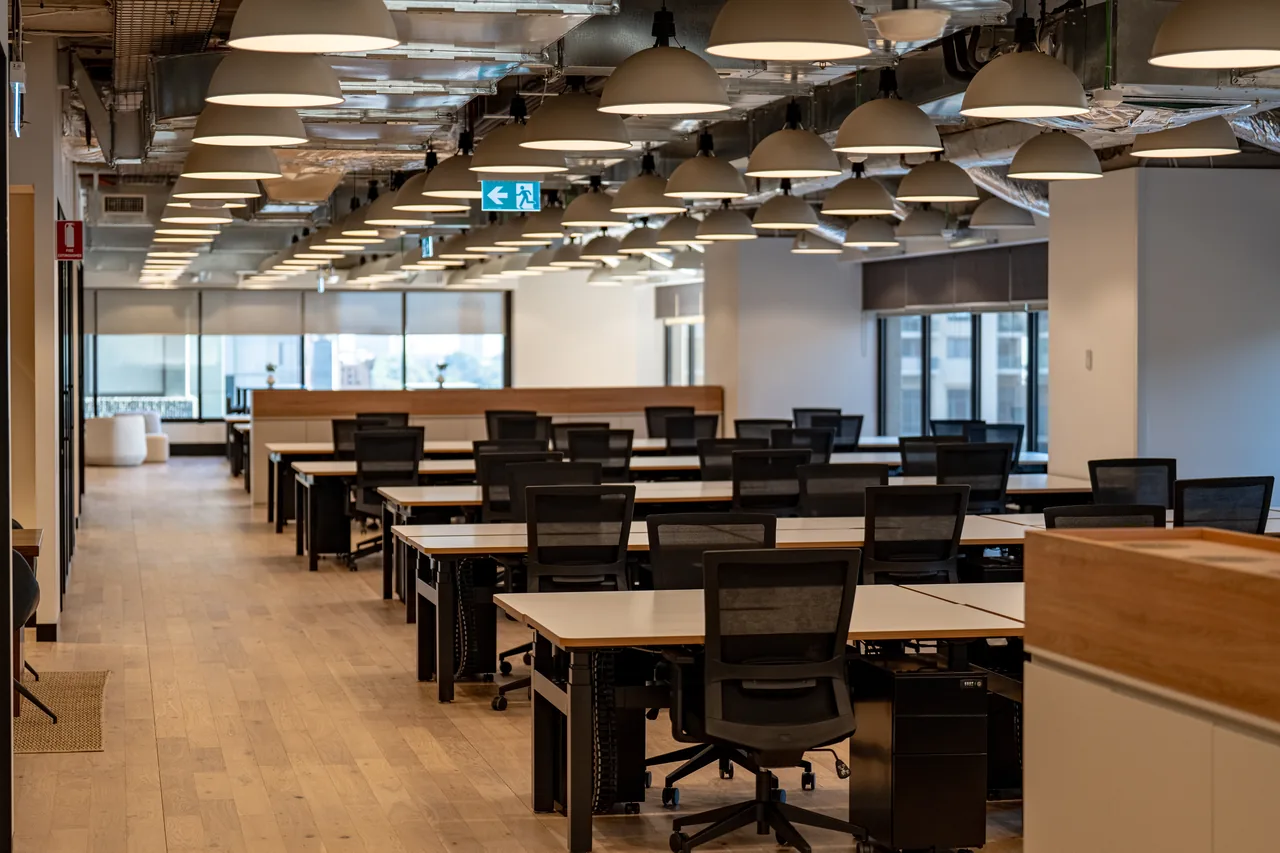 Rows of workstations installed across an open-plan office floor in Sydney