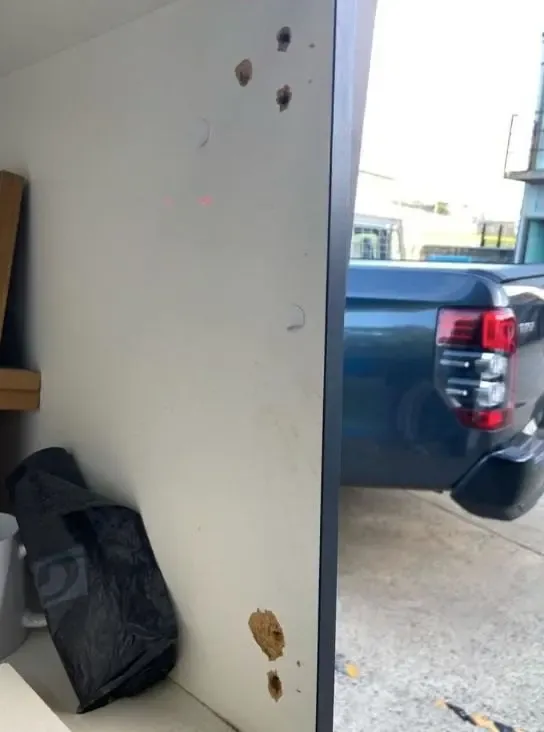 Before: chips and knocks through the paint on a wall