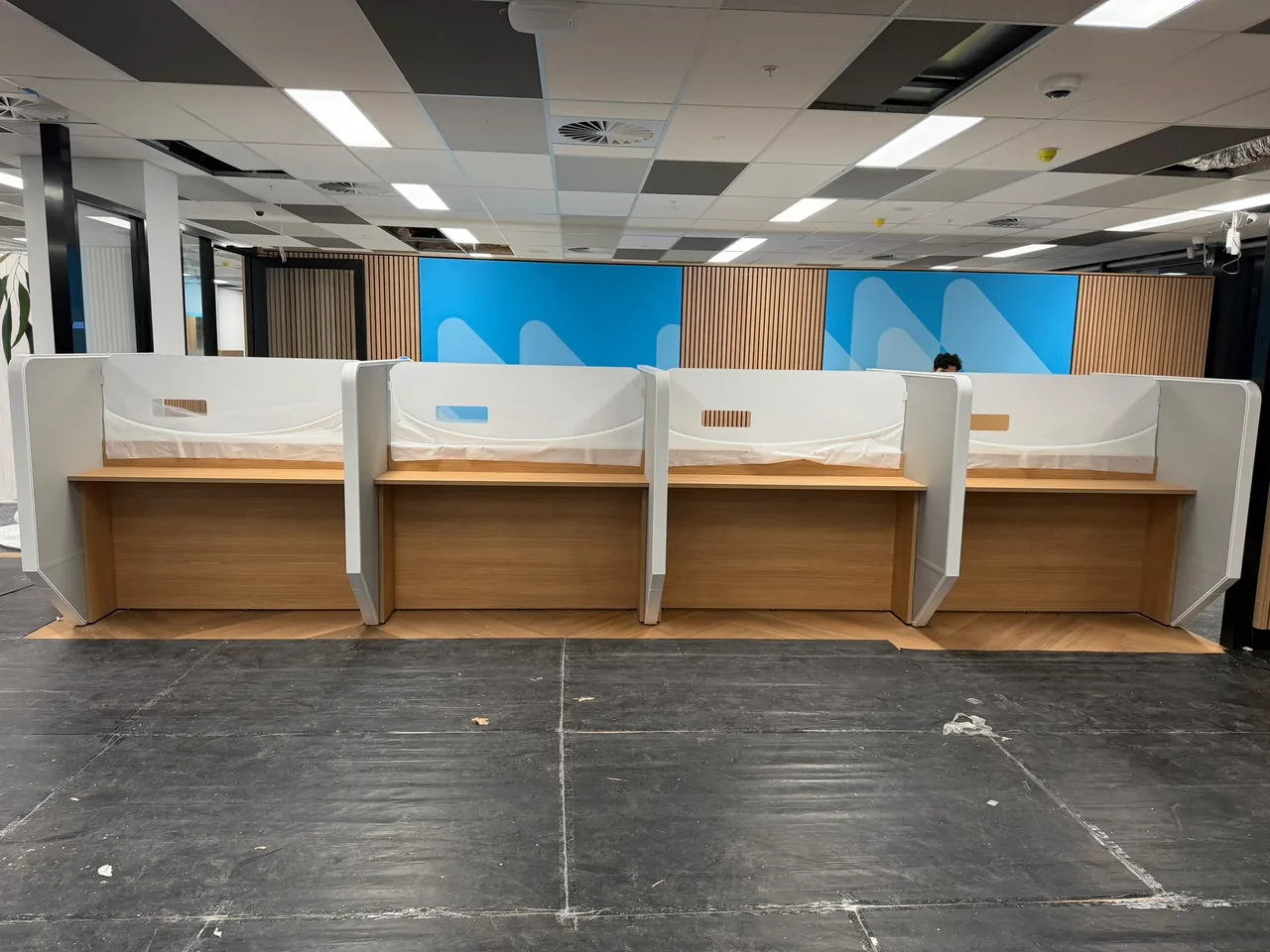 Row of customer service counters installed in a service centre
