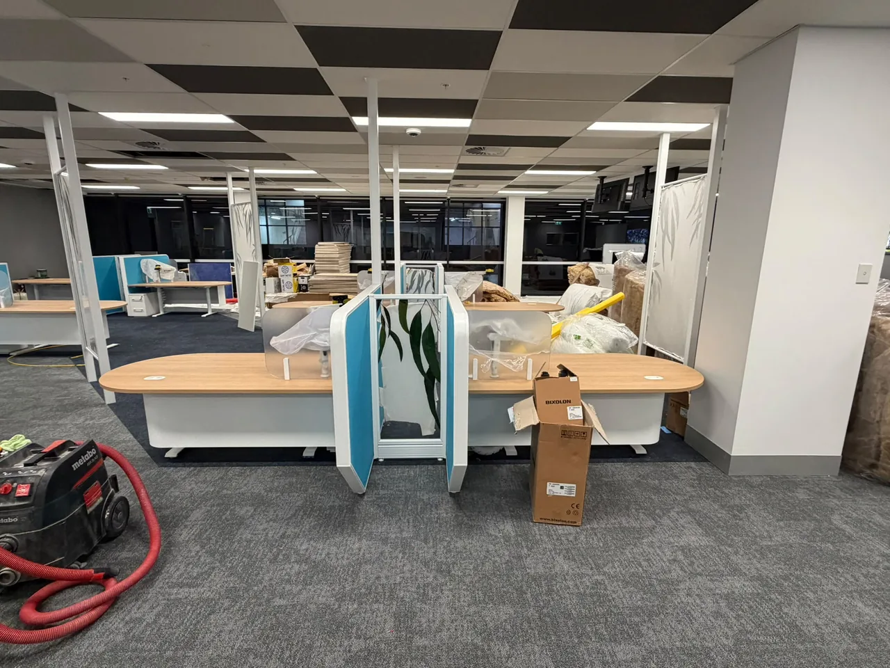 Customer service centre workstations being installed