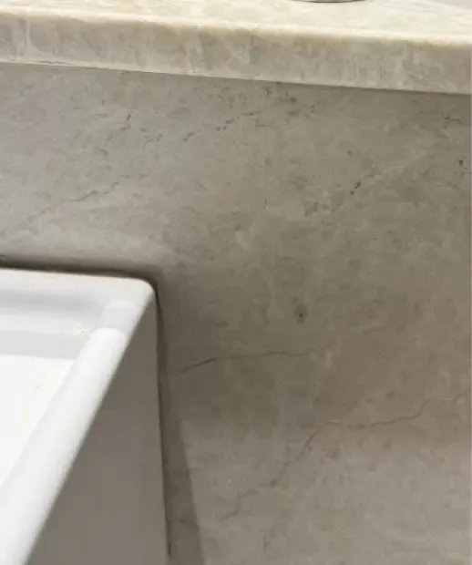 After: stone benchtop edge rebuilt with the veining carried through