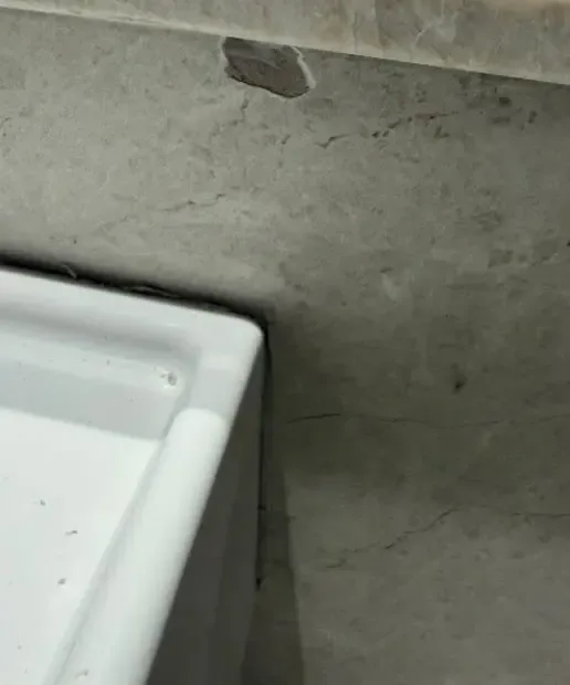 Before: chip in the front edge of a stone benchtop